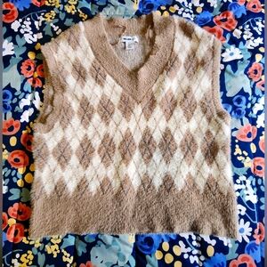 Vest cute and soft.  I'm just selling it because it's big for me. Never used.